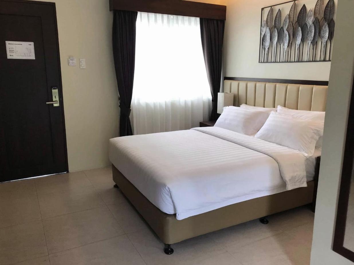 โรวิรา สวีท Hotel Dumaguete City ภายนอก รูปภาพ